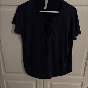 Jolie top lace up‎ front size medium.